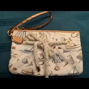 COACH PIERRE LE TAN BEACH PRINT WRISTLET